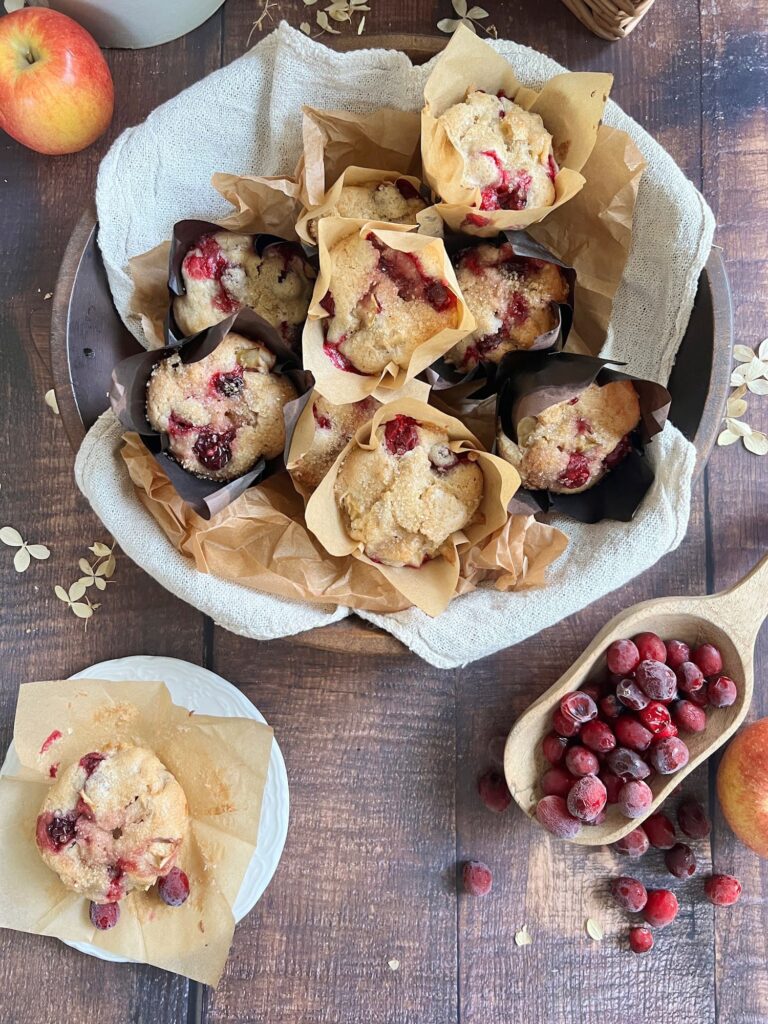 Easy Cranberry Apple Muffins in a wood bowl
