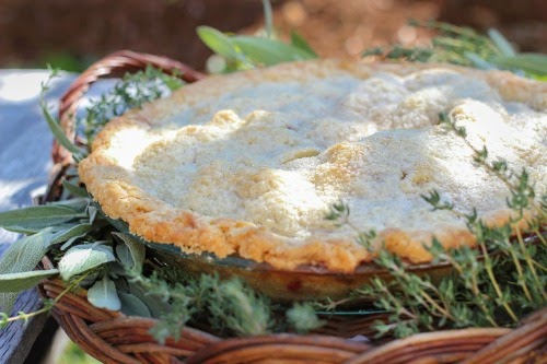 A whole pie in a basket. 