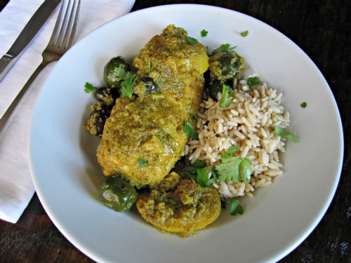 Chicken tagine with preserved lemons in a white bowl