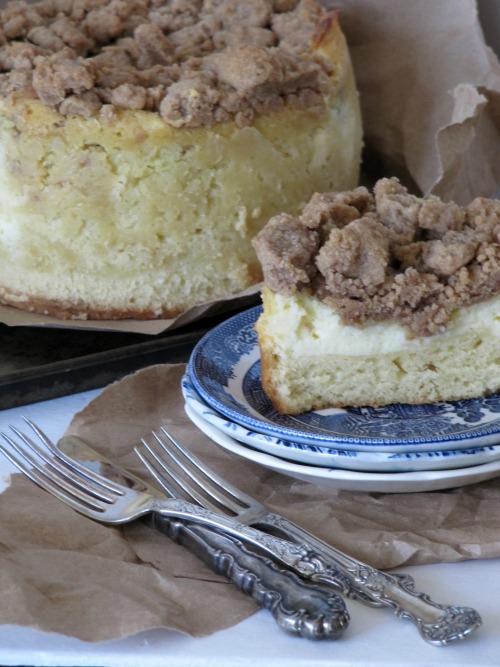 Amaretto coffeecake on blue and white transfer plates with vintage cutlery. 