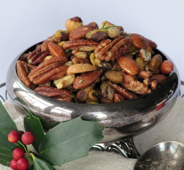 sweet spicy rosemary mixed nuts close up.