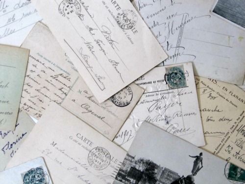A scattering of vintage and antique French post cards