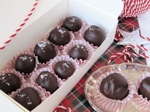 fleur-de-sel-truffles- in a white box tied with red and white string.
