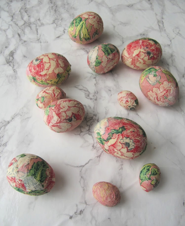 marble background with many colorful easter eggs