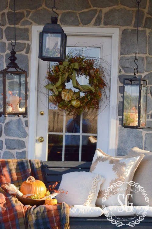 Fall Front Porch with plaid blanket. 
