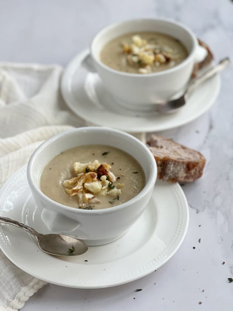 caramelized onion and cauliflower soup and crusty bread with salt and pepper.