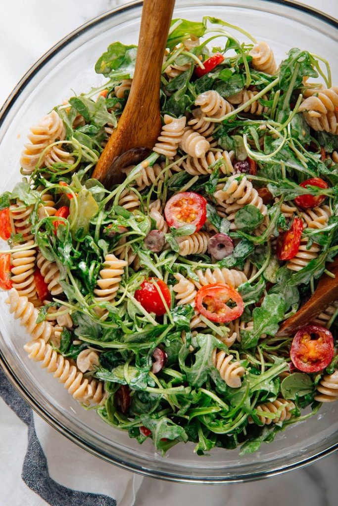 Arugula pasta salad with goat cheese.