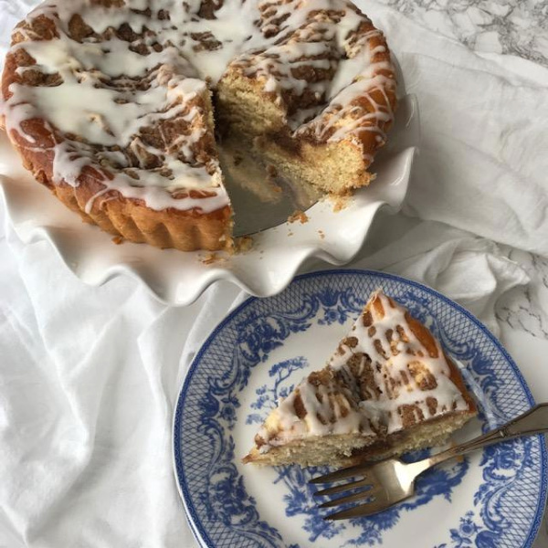 Cream cheese coffee cake on a plate. 