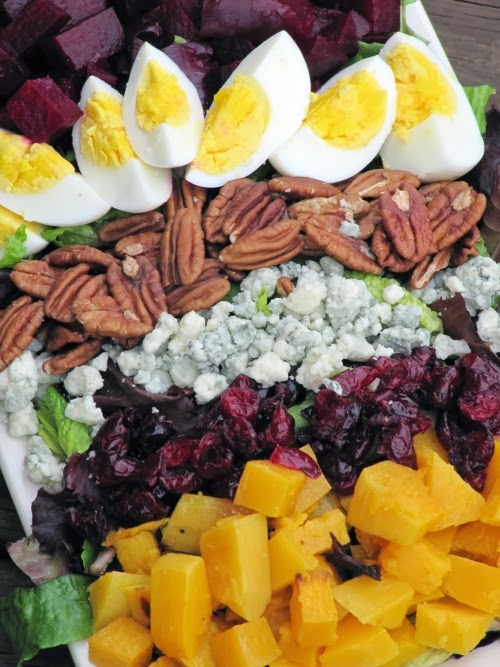what plate of salad with beets hard boiled eggs pecans blue cheese cranberries and squash