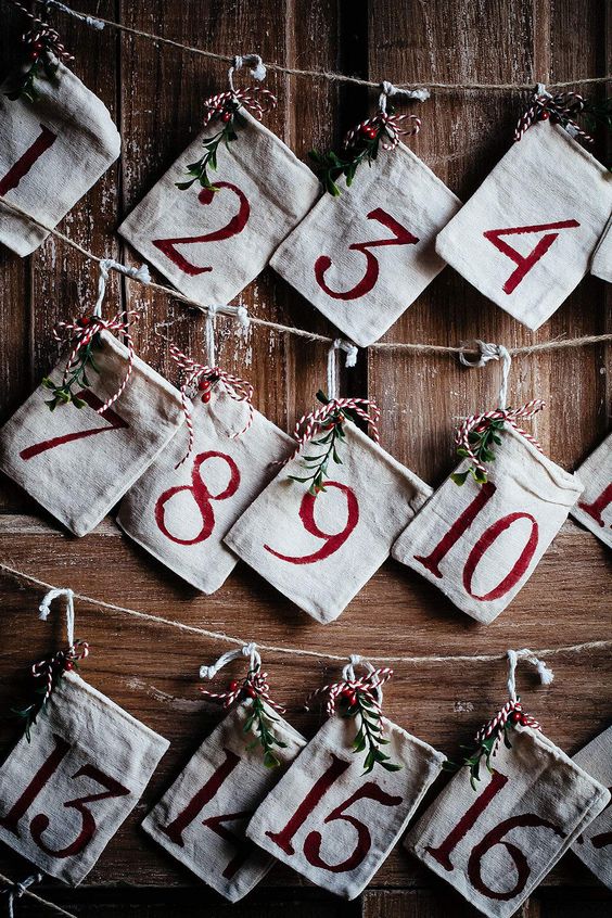 numbered bags hanging on strings advent calendar