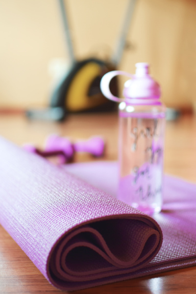 water and yoga mat