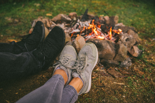 pair of feet by fire
