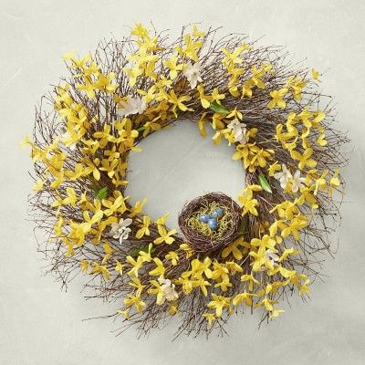 Yellow Forsythia wreath with bird nest