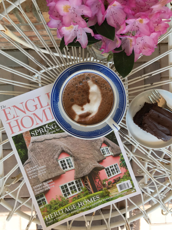 Friday Favorites flatlay hot chocolate spring flowers and chocolate cake on the porch