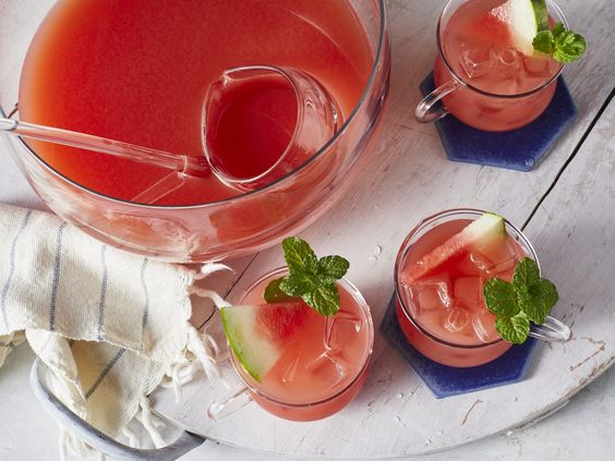 a clear glass punch bowl of 4th go July punch