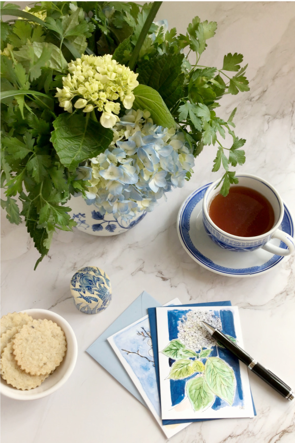 lavender lemon shortbread cookies and a cup of the with flowers flatlay