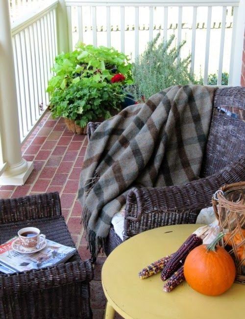 weekend meanderings Fall porch with plaid throw and pumpkins