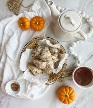 pumpkin scones flatlay with teapot and pumpkins