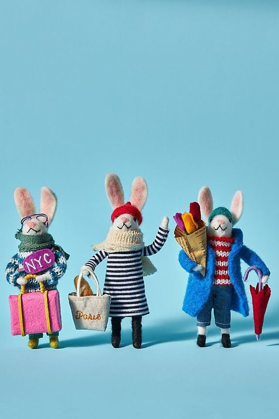 the little felted bunnies dresses in clothes to travel