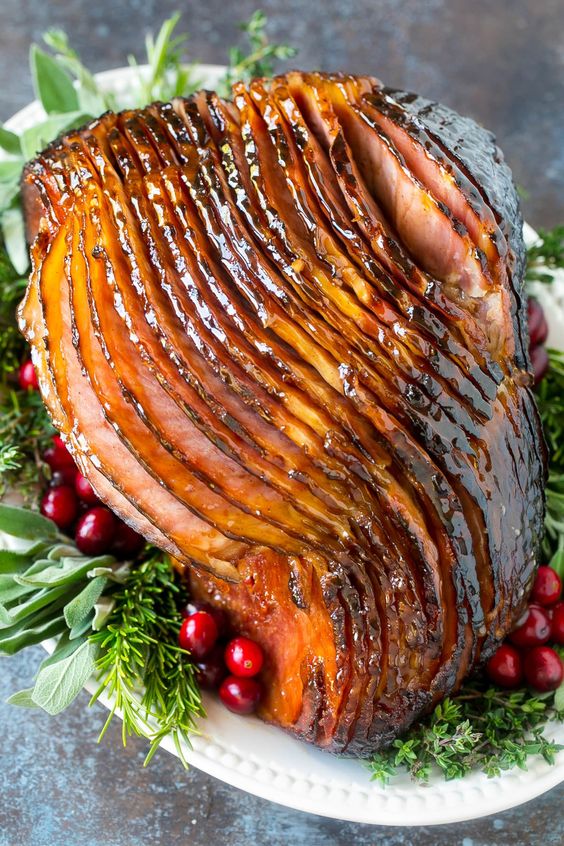 Glazed spiral ham with cranberries. 