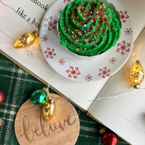 christmas cupcakes with sprinkles flatlay