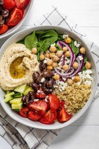 Mediterranean Hummus Bowl, an easy and delicious salad. Made with quinoa, fresh vegetables and homemade hummus.