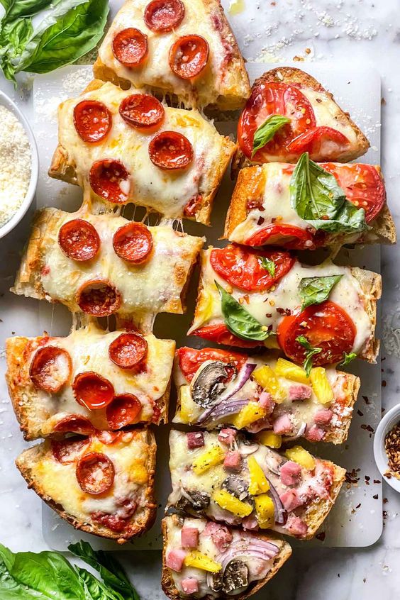 French bread pizza with pepperoni and vegetables. 