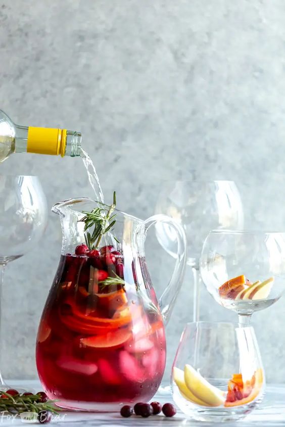 PITCHER OF Cranberry Orange Sangria with 2 glasses. 