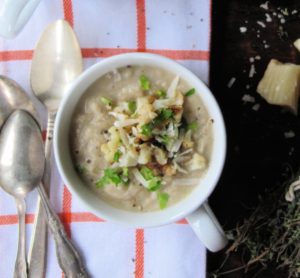 creamy-chicken-cauliflower-leek-soup in white bowl
