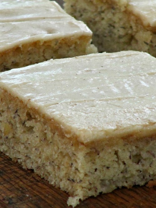 Close up of banana brownie bars with frosting. 