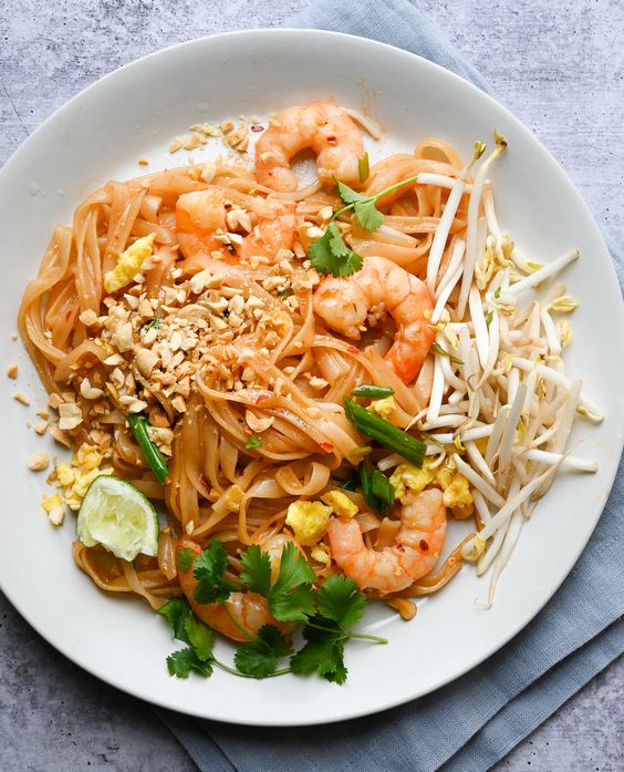 A white bowl of Shrimp Pad Thai. 