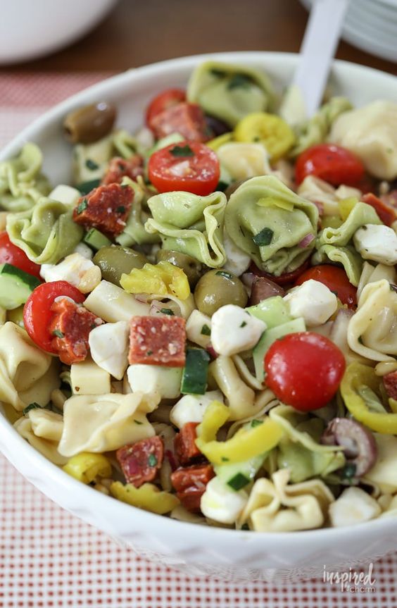 Tortellini Pasta Salad in a white bowl. 