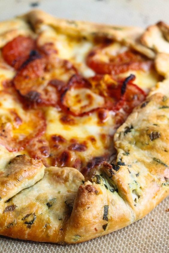 Tomato Mozzarella Galette with Basil Flecked Crust.