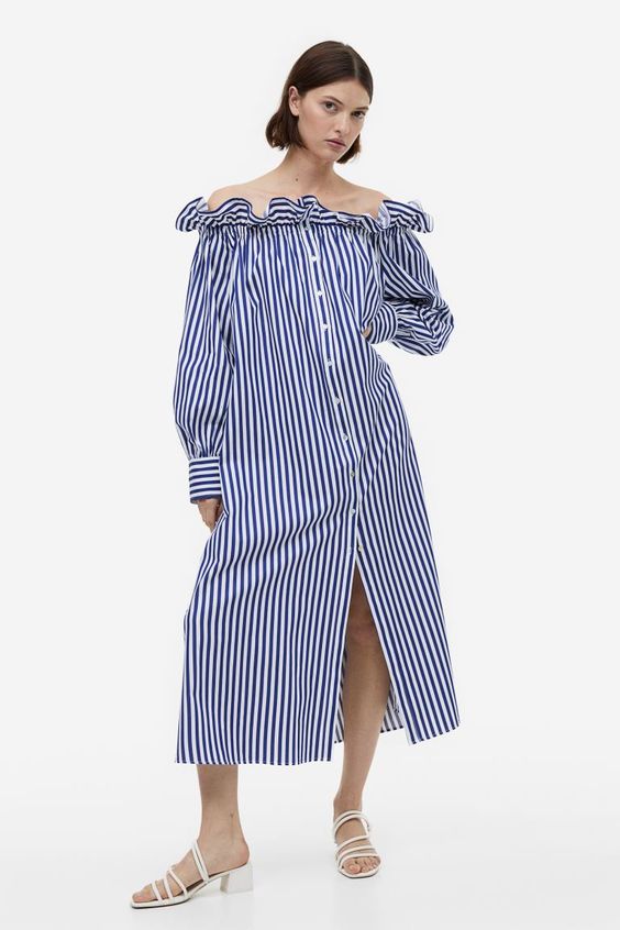 Blue and white stripe dress with ruffled shoulder. 