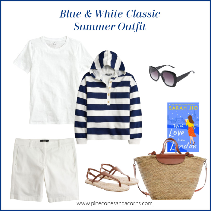 Blue and white shorts, t-shirt and striped sweatshirt with a straw tote, book, sandals.