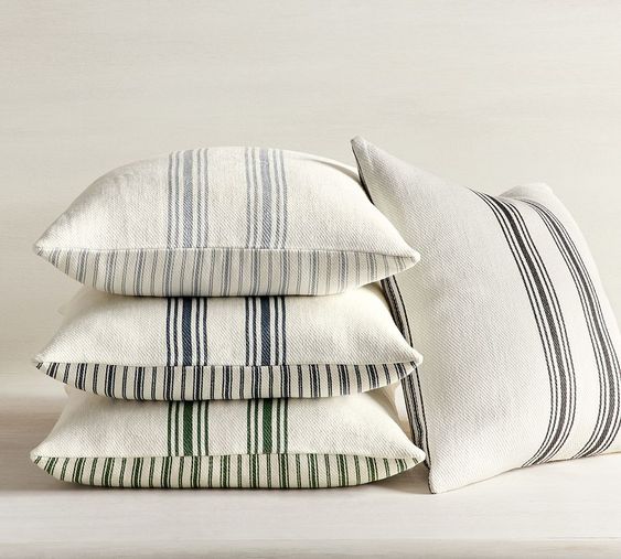 Strip Ticking Pillows on a stack. 