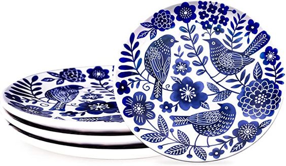 blue and white plates with birds