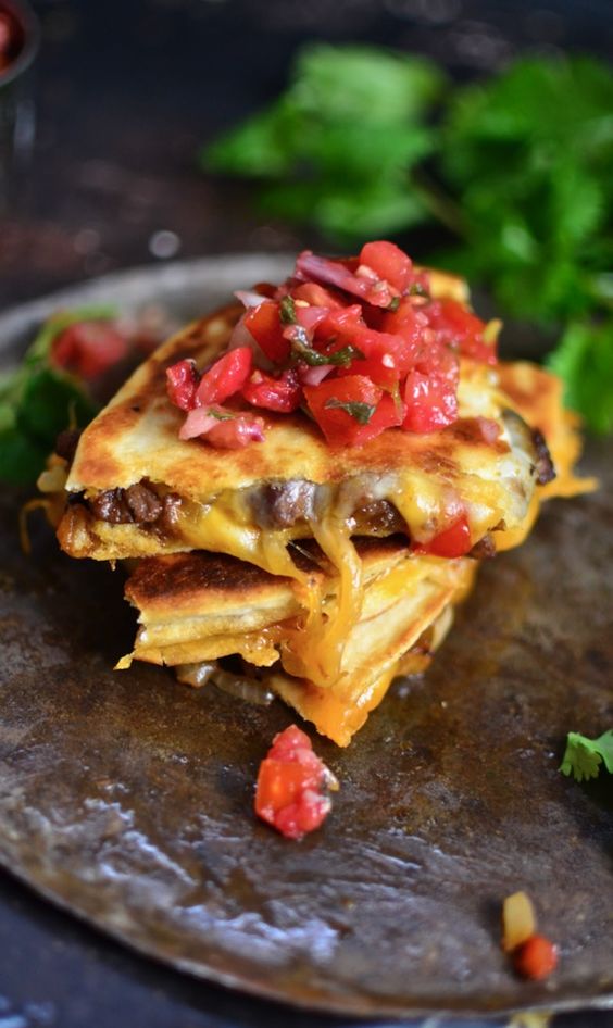Steak Quesidilla with cheese and salsa. 