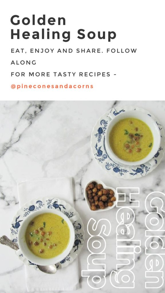 Golden Healing Soup in 2 white bowls with a heart shaped bowl of chick peas. 