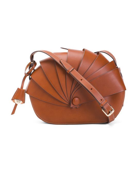 A brown leather purse. 