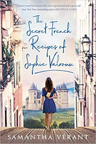 The Secret French Recipes of Sophie Valroux book cover of a woman in a blue dress walking in a French village towards a chateau.