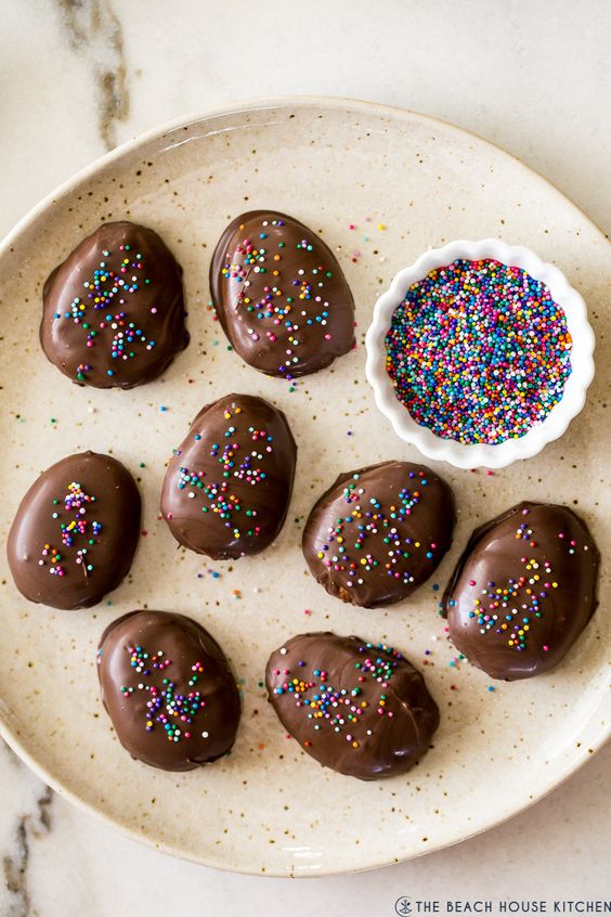 Homemade Peanut Butter Eggs with colorful sprinkles.