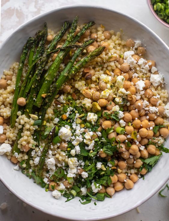 SPRING COUSCOUS BOWLS WITH LEMON FETA VINAIGRETTE.