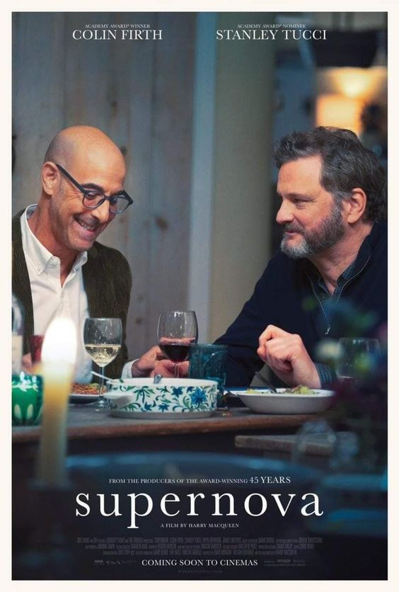 Supernova movie poster with 2 men sitting at a table eating and drinking wine. 