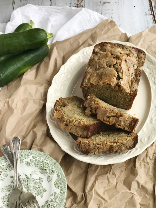 sliced zucchini bread on a platter.