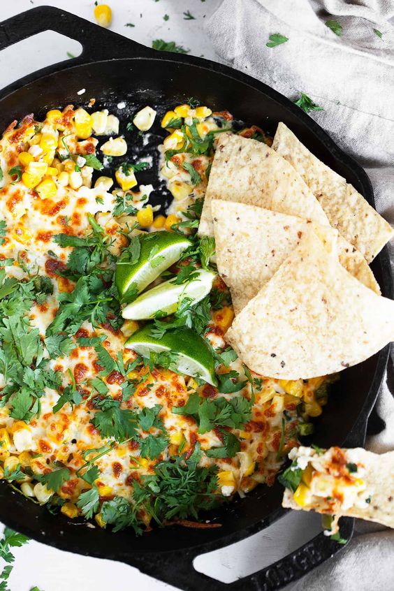 Mexican Corn Cheese Dip in a cast iron skillet. 