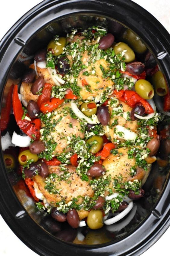 Crokcpot greek chicken with olives, lemons, onions and peppers. 