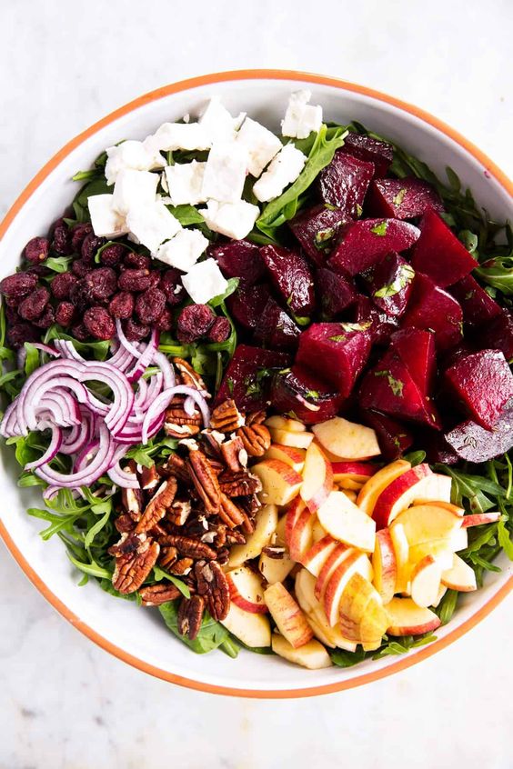 Roasted beet salad with apples, red onion, walnuts and cheese. 