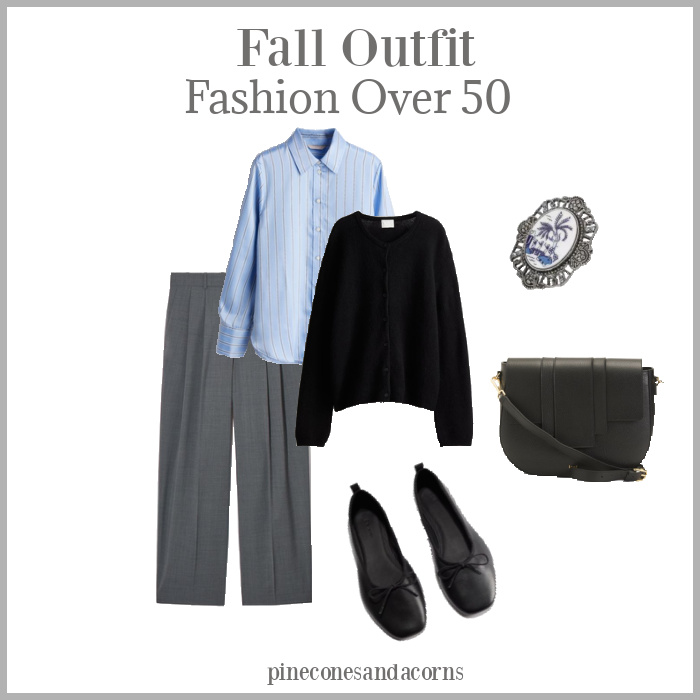 Fall Outfit Fashion over 50 gray pants, blue stripe shirt, black cardigan, ballet flats and bag along with a blue, white and silver brooch. 