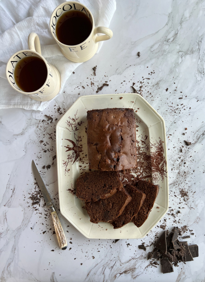 Ina Garten's Triple Chocolate Loaf Cake with 2 cups of coffee. 
